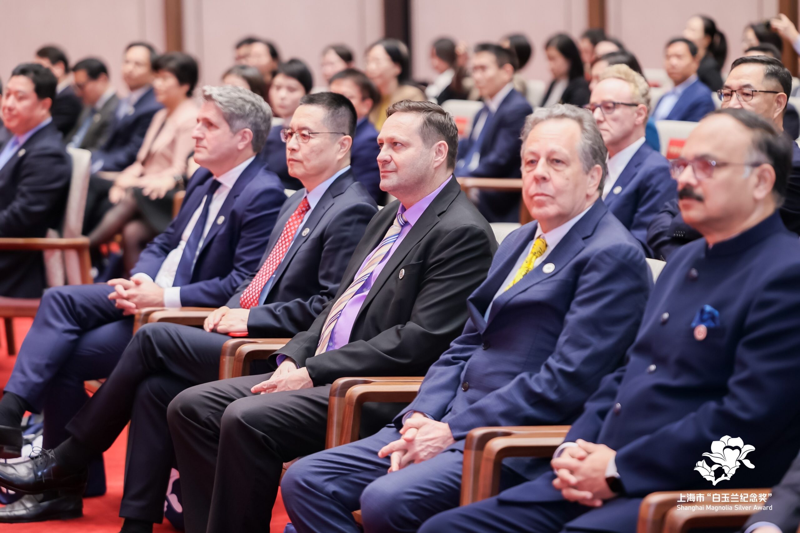 Dr Patrick Berbon receiving the Shanghai Magnolia Award